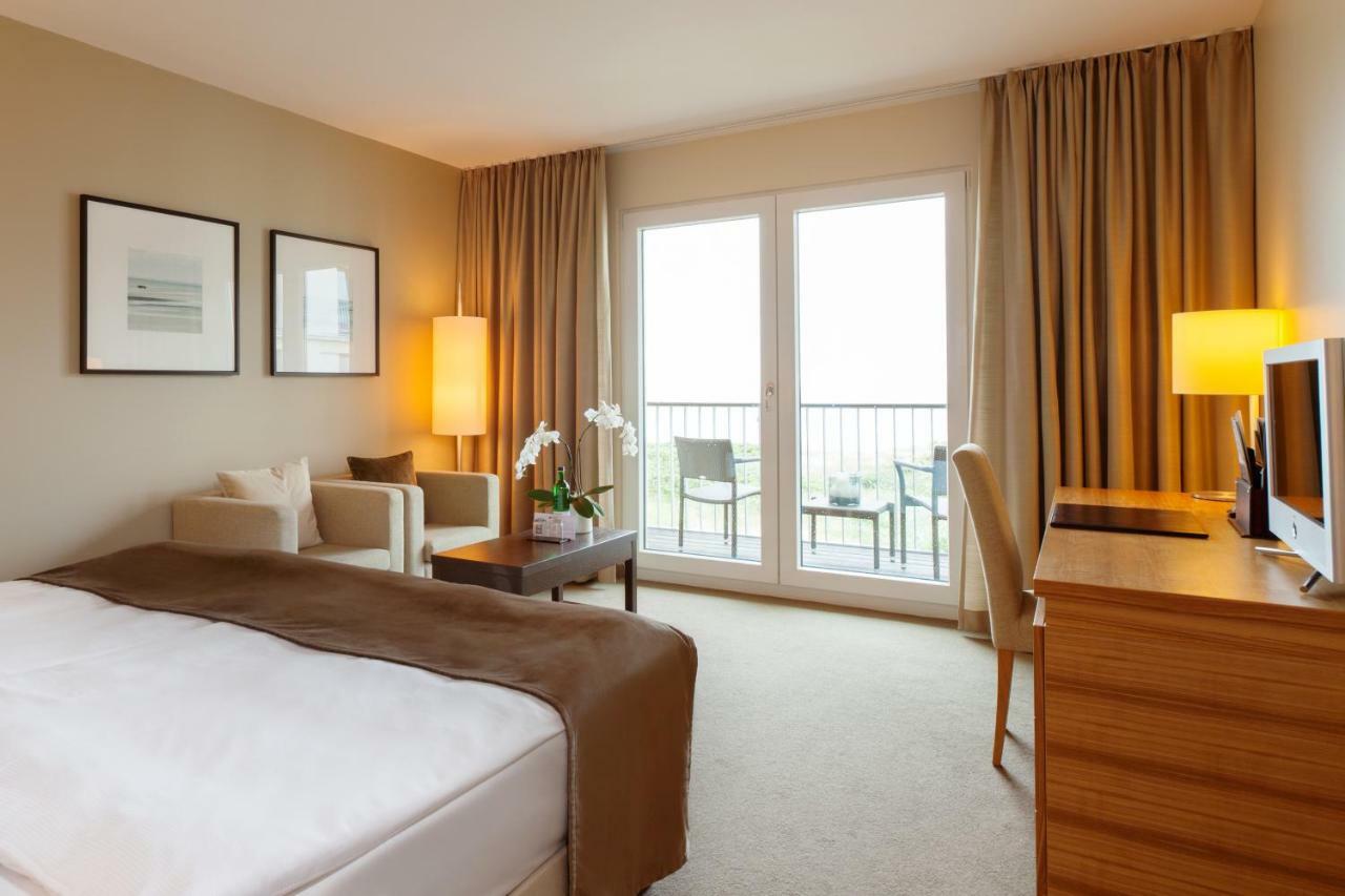 Отель A-Rosa Sylt Лист Экстерьер фото A typical room at the hotel